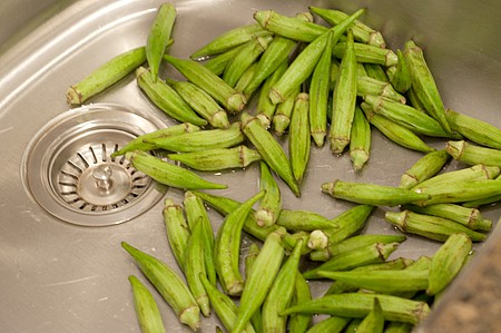 Washing okra for pickled okra