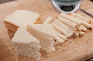 Preparing bread for Ham and Cheese Strata