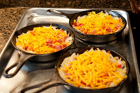 Add cheese to skillets