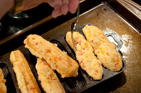 Loosen the corn sticks from the pan Loosen the corn sticks from the pan