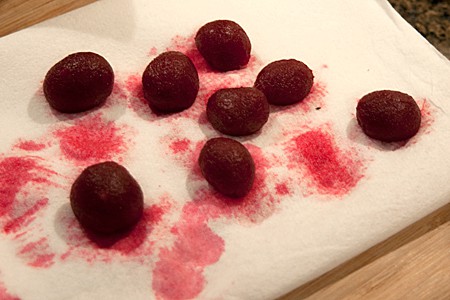Draining pickled baby beets Draining pickled baby beets