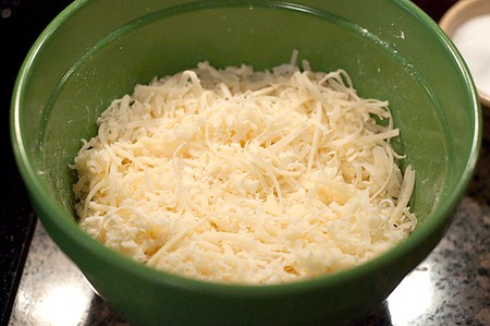 Grating cheese for cheese fondue