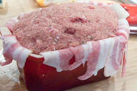 Pack the meat mixture into the terrine