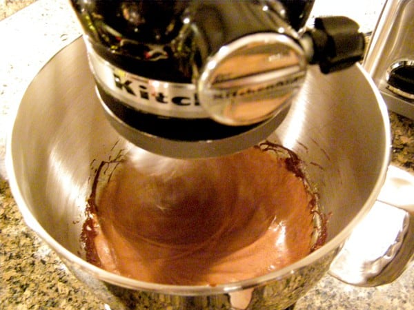 Chocolate added to mixture in stand mixer.