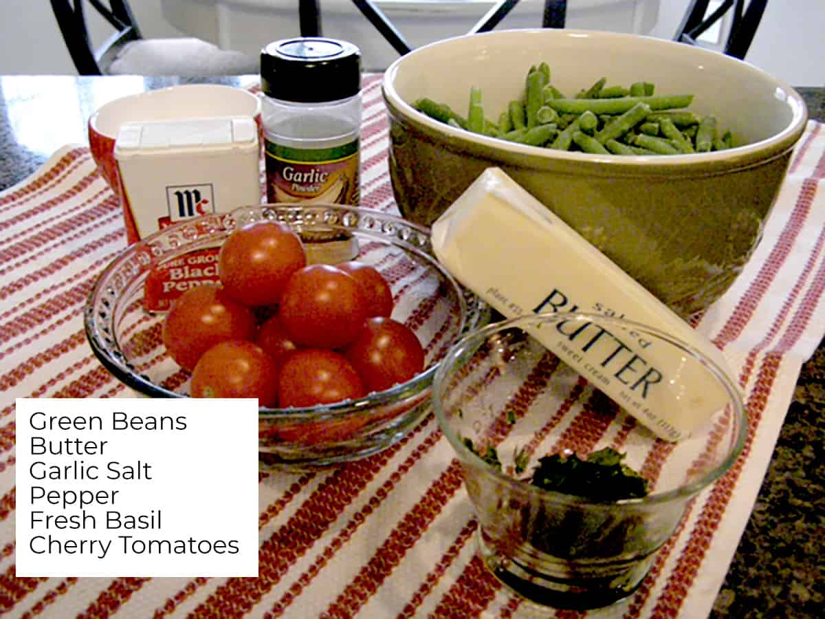 Ingredients needed to make green beans and cherry tomatoes.