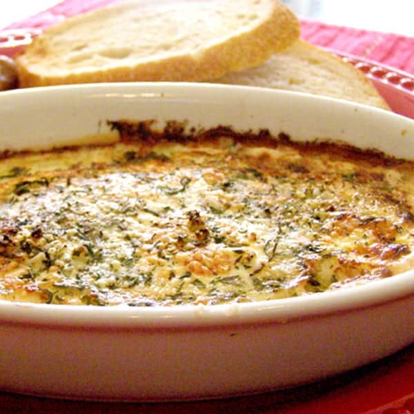 Herbed Baked Eggs - Eggs baked in cream and butter and flavored with garlic, thyme, rosemary and Parmesan cheese. https://www.lanascooking.com/herbed-baked-eggs