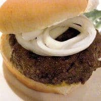 Burgers Nana Style are simple, juicy, and delicious. Start with high quality ground beef, add the seasonings, and cook until done to perfection. https://www.lanascooking.com/burgers-nana-style/