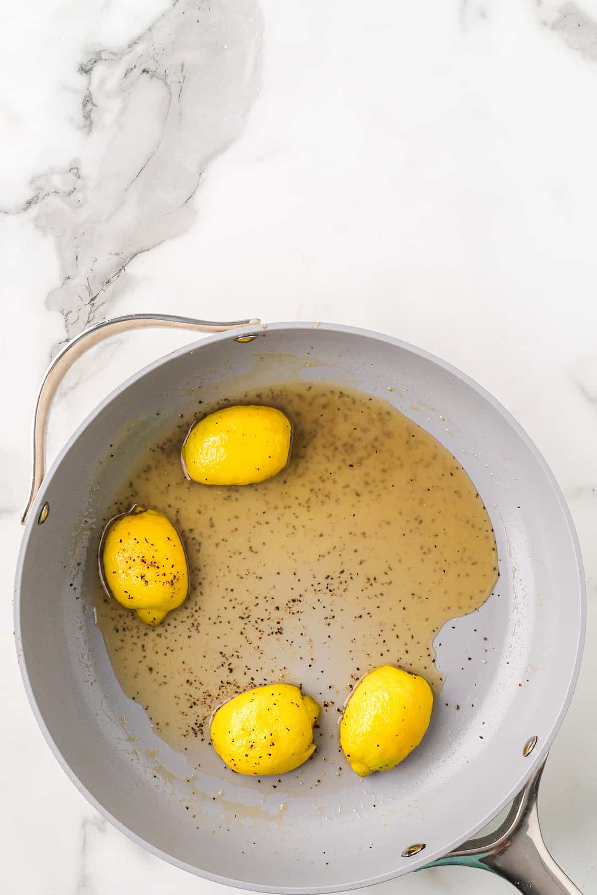 Making the sauce in a skillet.