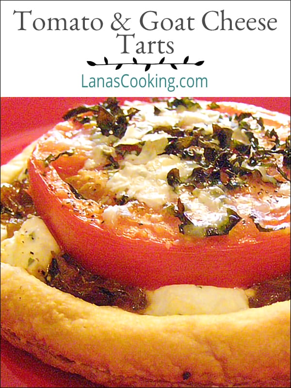 Savory Tomato Goat Cheese Tarts made with purchased puff pastry, fresh tomatoes, goat cheese, and fresh basil. Lovely to serve for a spring brunch. https://www.lanascooking.com/savory-tomato-goat-cheese-tarts/