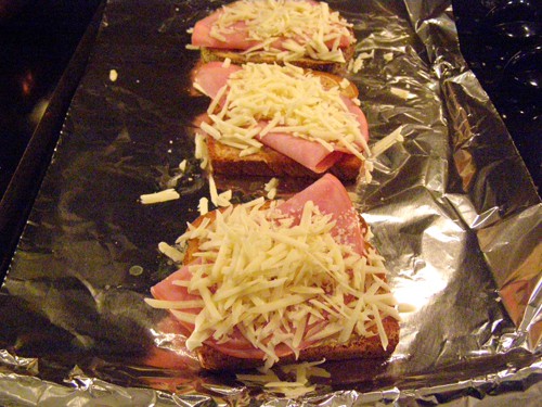 croque_assemblystep3 Ham topped with Gruyere cheese.