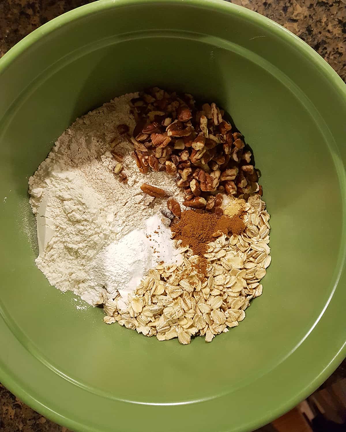 Medium bowl containing dry ingredients for the recipe.