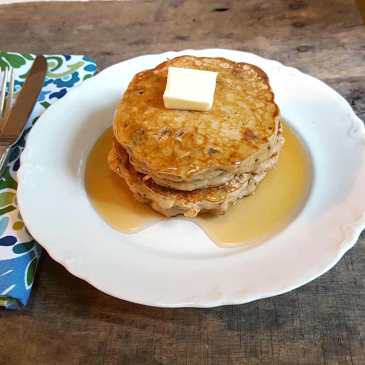 Oatmeal Cookie Pancakes - take an oatmeal cookie recipe and translate it into pancakes and you have a wonderfully delicious breakfast! https://www.lanascooking.com/oatmeal-cookie-pancakes/