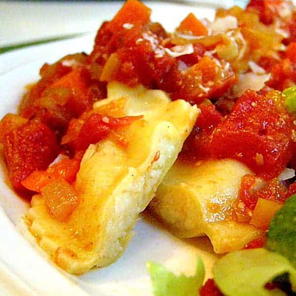 Cheese Ravioli with Chunky Tomato Sauce - delicious ravioli filled with four cheeses and topped with a chunky tomato and veggie sauce. https://www.lanascooking.com/ravioli-with-chunky-tomato-sauce/