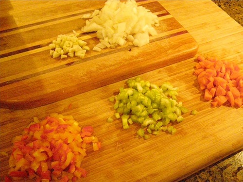 Prepped veggies on a cutting board.