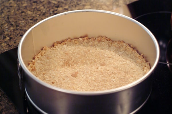 Baked and cooled crust in a springform pan.