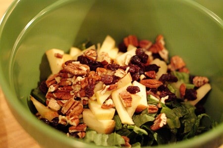 Salad ingredients in a mixing bowl.