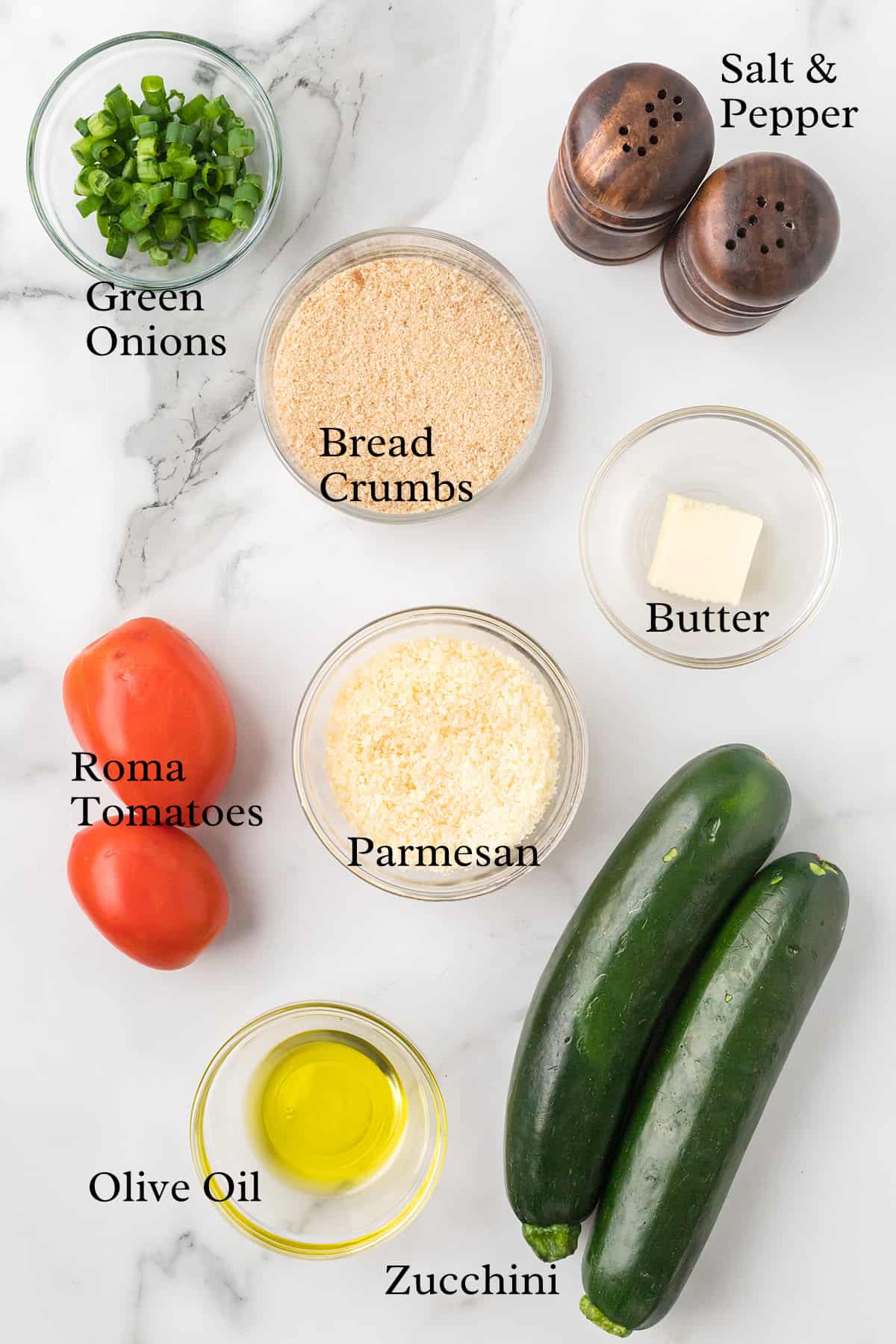 Ingredients needed to make stuffed zucchini.