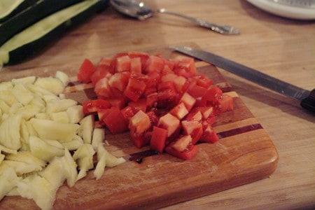 Diced tomatoes on a board.