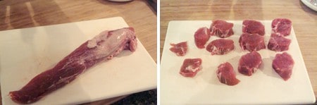 Pork tenderloin cut into serving sized pieces on a board.