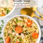 A serving of soup in a white bowl.