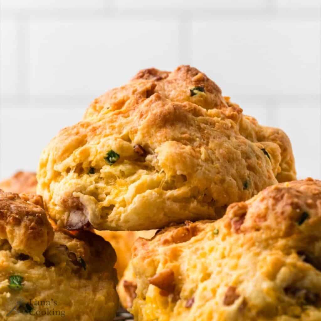 A stack of finished bacon cheddar biscuits.