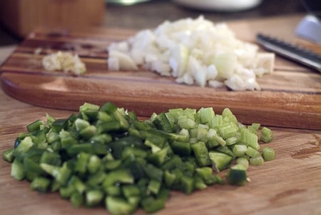 Diced bell pepper, celery, onions, and garlic.