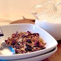 This budget friendly Homemade Granola contains whole grains along with pecans, dried berries, dried cherries, and golden raisins. https://www.lanascooking.com/homemade-granola/