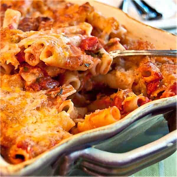 Finished baked ziti in a baking dish.