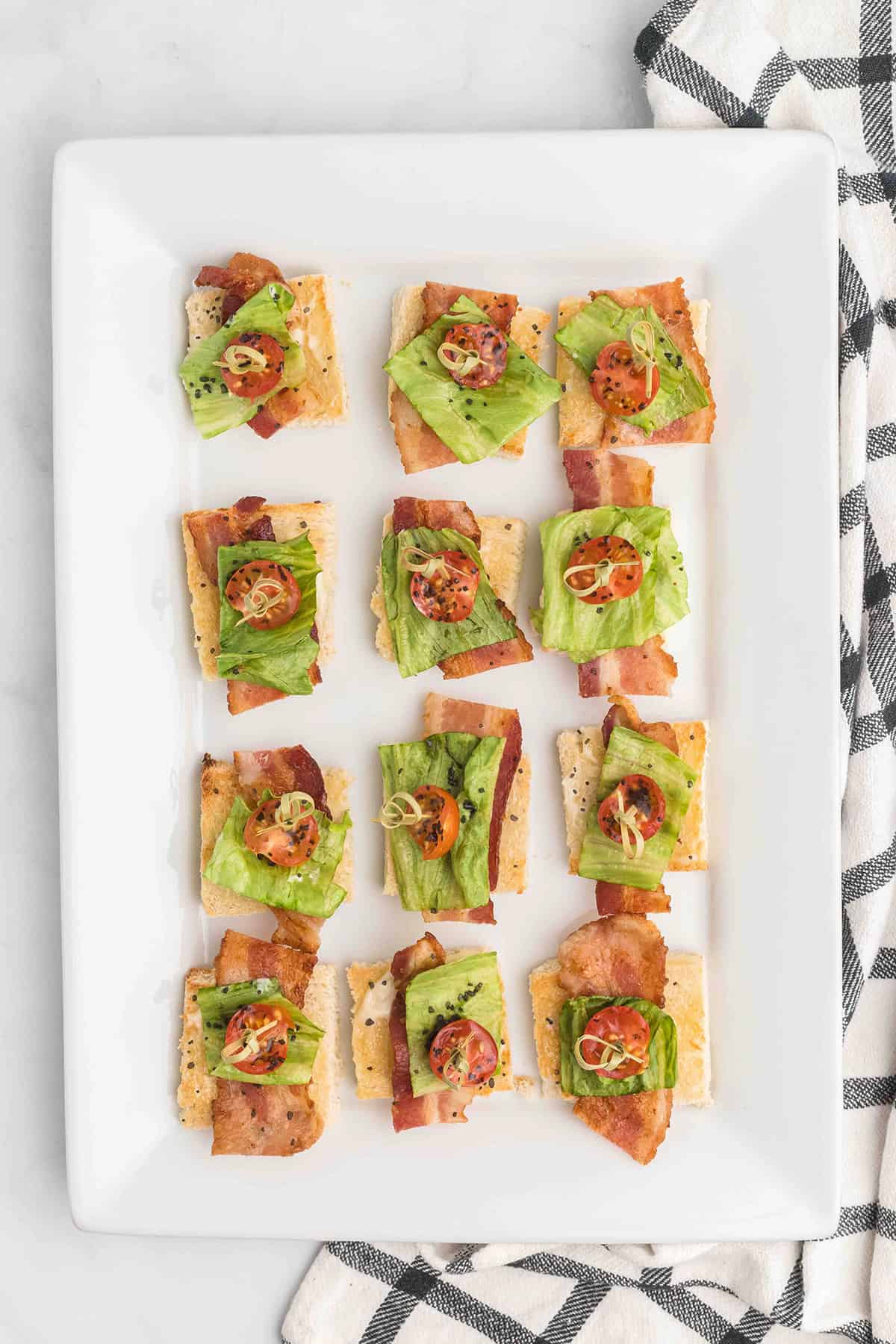 BLT Bites on a white serving plate.