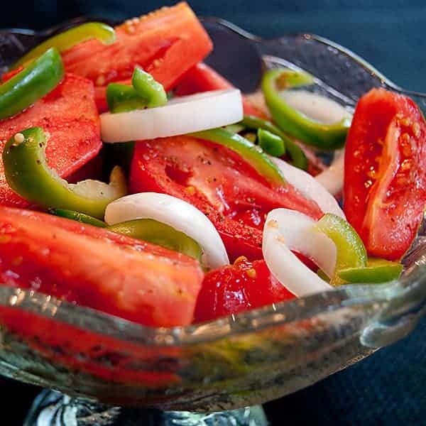 This vintage recipe for Fire and Ice Tomatoes is a sweet-tart salad with late summer tomatoes, bell peppers, and sweet Vidalia onions. https://www.lanascooking.com/fire-and-ice-tomatoes/