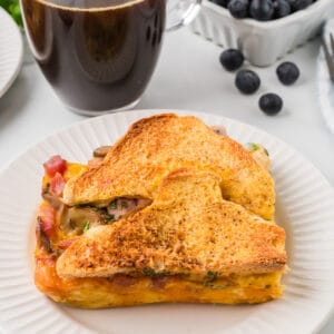 A serving of strata on a white plate.