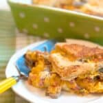 This ham and cheese strata contains layers of ham, cheese and mushrooms with bread, eggs and milk for a fabulous weekend or special occasion breakfast. https://www.lanascooking.com/ham-and-cheese-strata/