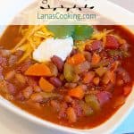 Vegetable Chili - this recipe for meatless vegetable chili is hearty, spicy and full of beans and veggies. Make it truly vegetarian with a vegetable stock. https://www.lanascooking.com/vegetable-chili/