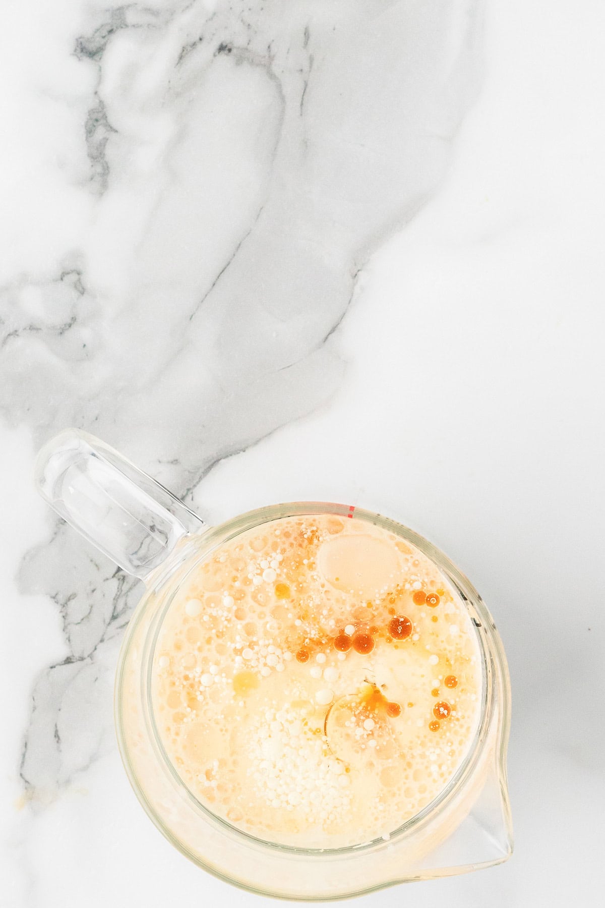 All wet ingredients mixed in a measuring cup.