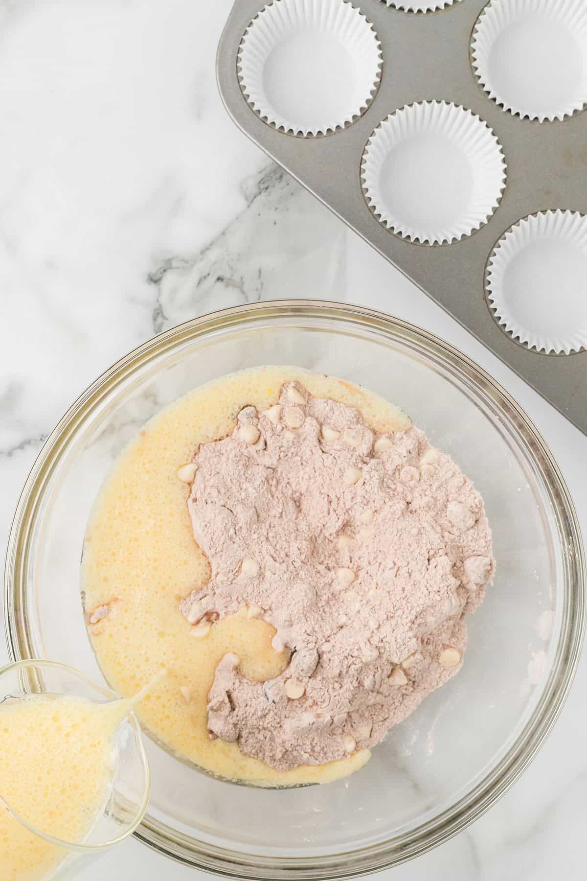 Wet ingredients poured into dry ingredients.