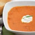 Tomato Tarragon Soup - a richly flavored tomato and tarragon soup with a sour cream garnish. Fantastic served with crusty French bread. https://www.lanascooking.com/tomato-tarragon-soup/