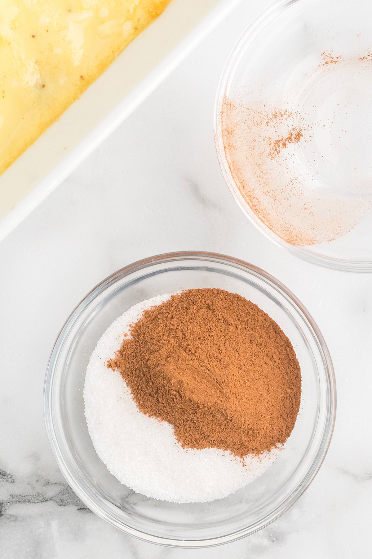 Cinnamon and sugar in a bowl.