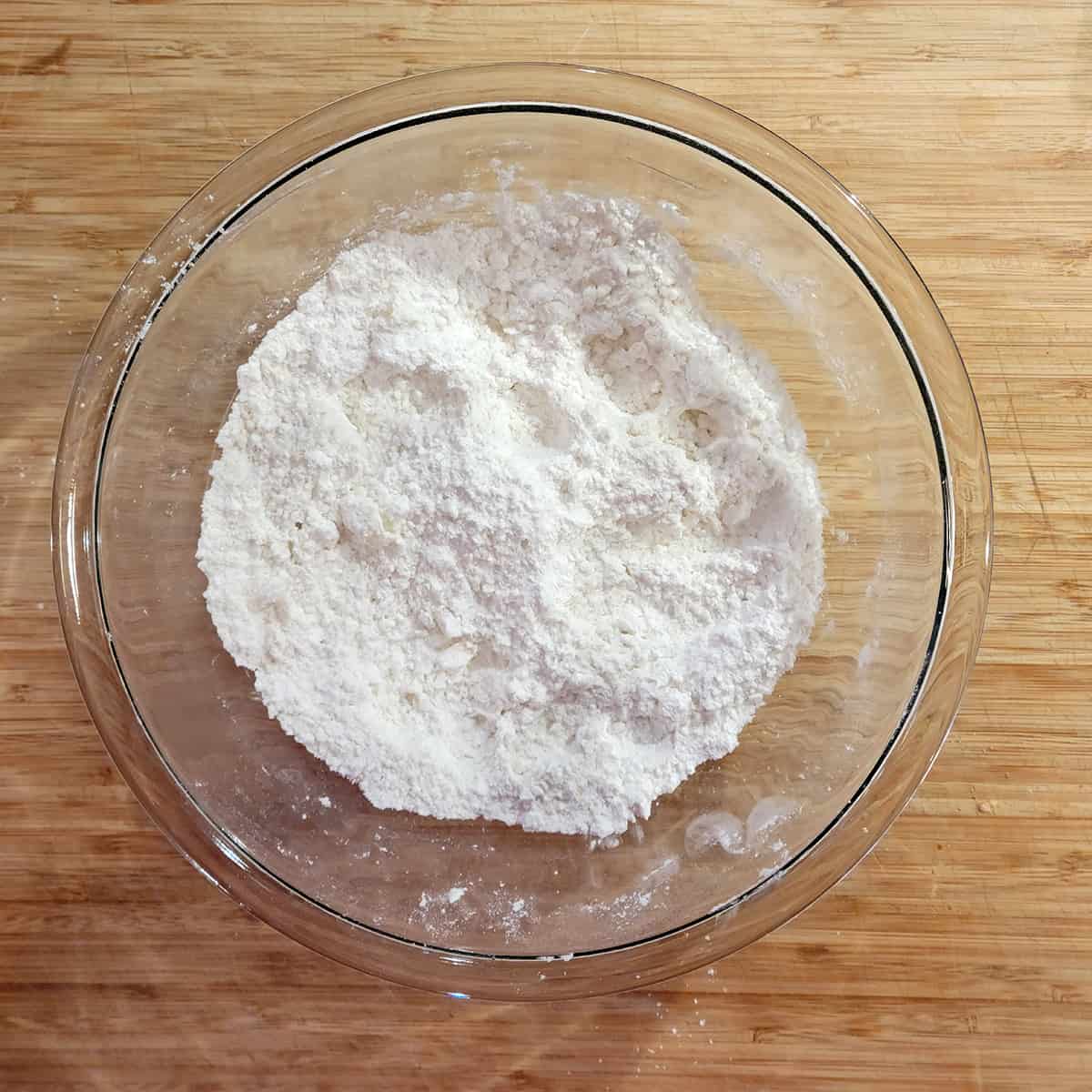 Butter cut into the flour.