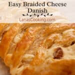 Finished braided danish cooling on parchment paper.