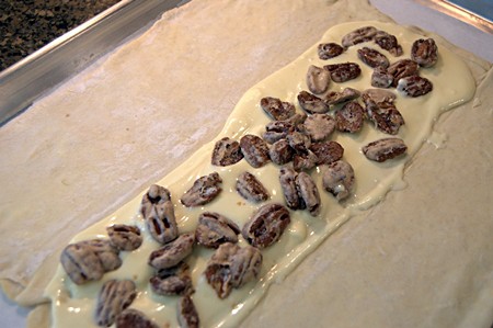 Candied pecans added to cream cheese filling.