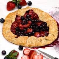 Berry Crostata - this mixed berry crostata combines strawberries and blueberries in a pie crust to create a free-form tart. https://www.lanascooking.com/berry-crostata/