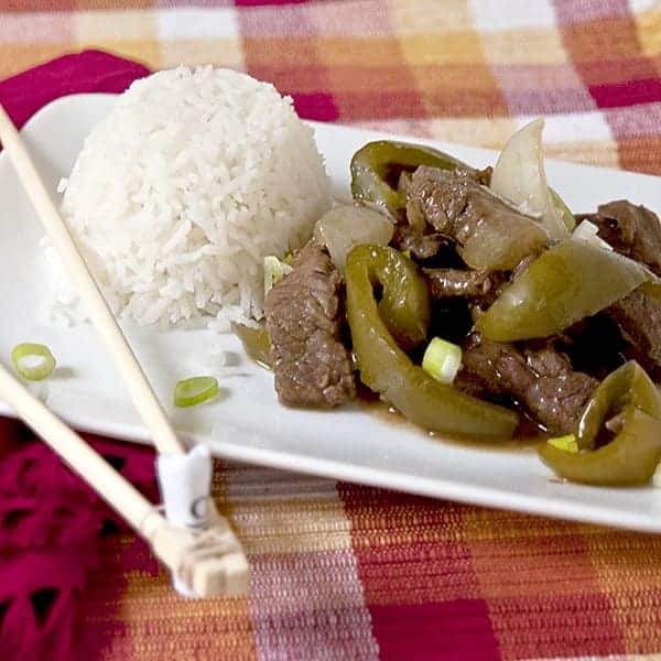 Steak and Peppers is a go-to meal for busy weeknights. Braised round steak with green peppers and onions is served with steamed white rice. https://www.lanascooking.com/steak-and-peppers/
