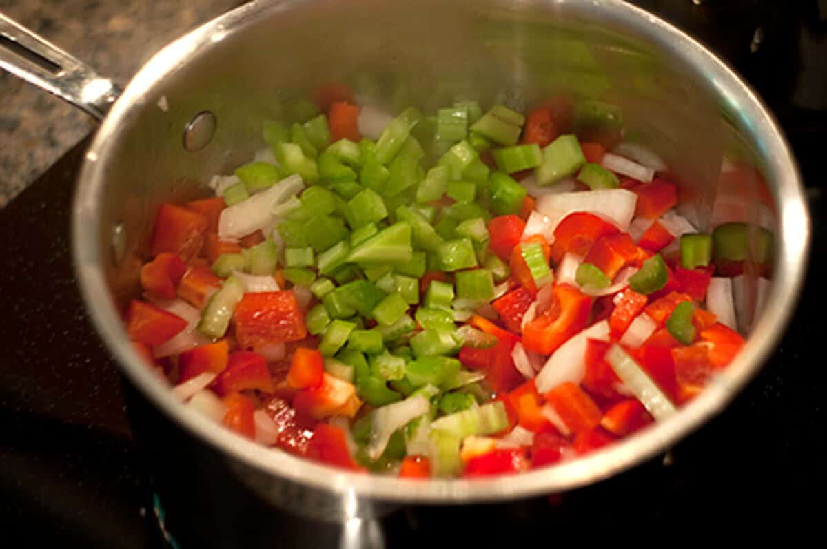 Chopped vegetables in a skillet.