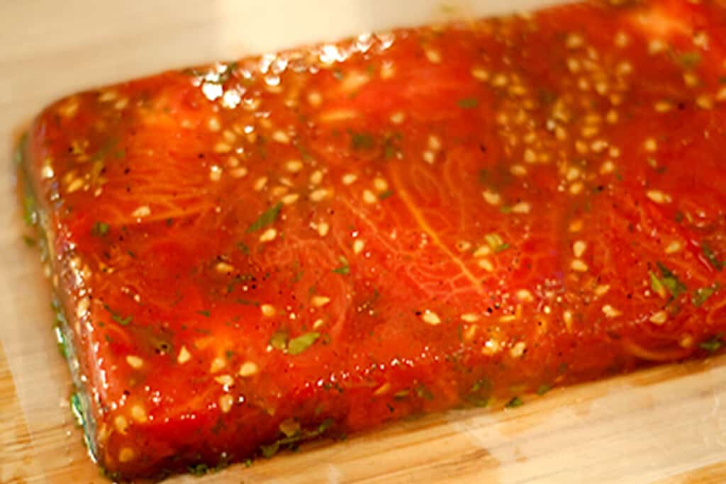 Tomato Aspic inverted for serving Finished aspic ready to cut into squares.