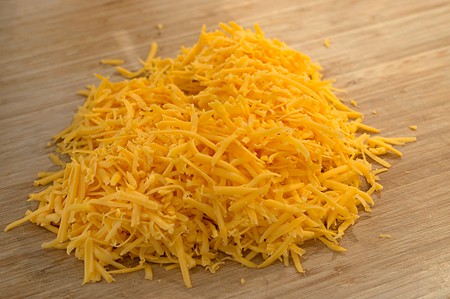 Grated extra sharp cheddar cheese.