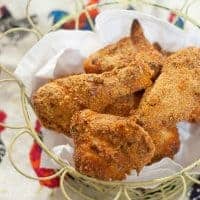 Buttermilk Baked Chicken - Chicken marinated in buttermilk and seasonings, coated with corn flake crumbs and Parmesan cheese and baked until crunchy. https://www.lanascooking.com/buttermilk-baked-chicken