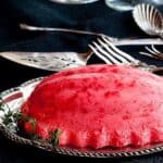 Polly's Pink Stuff - A retro recipe for a festive raspberry jello mold. http://www.lanascooing.com/pollys-pink-stuff-raspberry-jello-mold/
