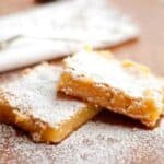 Rich and buttery Lemon Bars made with Meyer lemon juice and zest. A delicious afternoon treat with a cup of tea or coffee. https://www.lanascooking.com/lemon-bars/