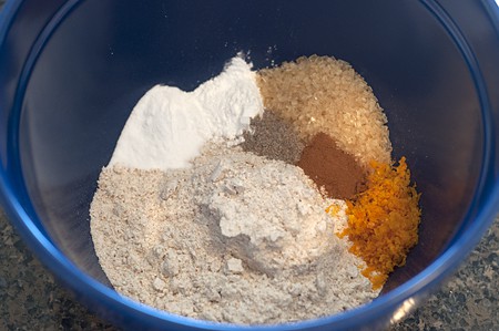 Dry ingredients in a blue mixing bowl.