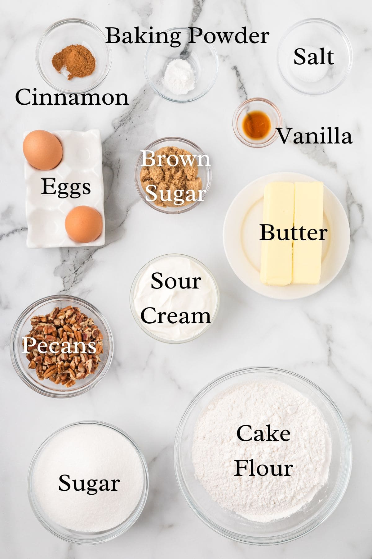 Ingredients for sour cream pecan coffee cake in separate containers.